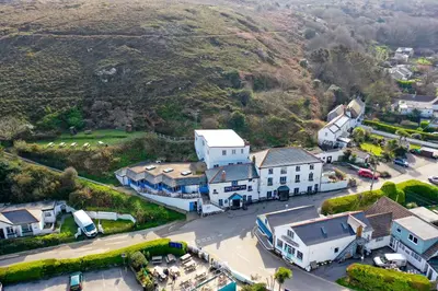 an aerial view of a small town in a mountain at Driftwood Spars in St. Agnes