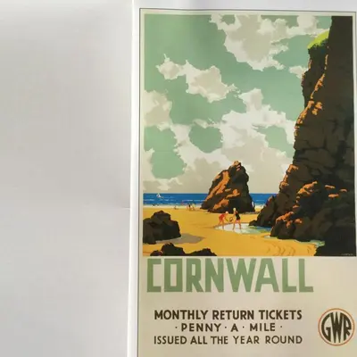 a poster of a beach with people walking on the sand at Down Ende House Accommodation in Looe