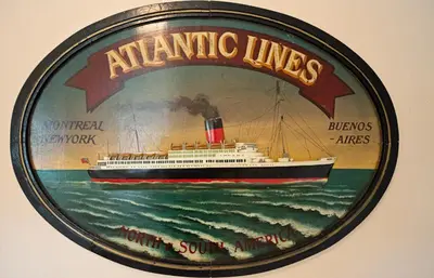 a picture of a ship hanging on a wall at Down Ende House Accommodation in Looe