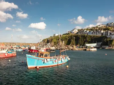 a group of boats sitting in the water at Nectan in St Austell