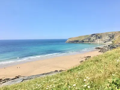 a view of a beach with the ocean at Beach Hut in Tintagel