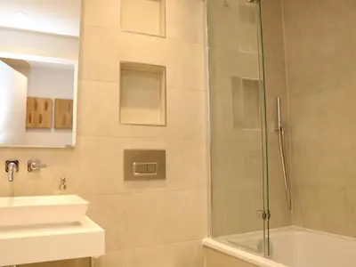 a bathroom with a shower and a sink at Little Fistral in Newquay