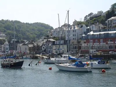 a group of boats in the water in a harbor at Samuels Cottage in Lanreath