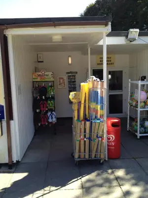 a building with a store with a lot of merchandise at Seaside Bungalow in St Ives
