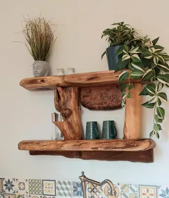 a wooden shelf with plants on a wall at Wesley House Holidays - Choice of 2 Quirky Cottages in 4 private acres in Redruth