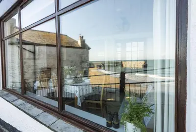 a view from the window of a house at Cliff Cottage in Gorran Haven