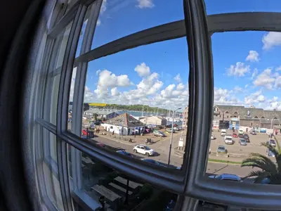 a view from a window of a parking lot at The Grove Falmouth in Falmouth