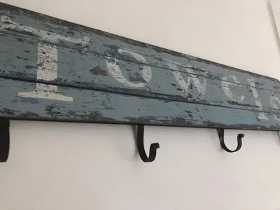 a sign that reads no exit hanging on a wall at Bay House Lundy Port Isaac Apartment with Sea Views & Parking in Port Isaac