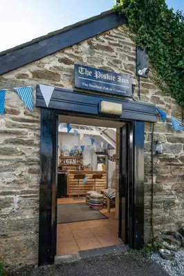 a building with a sign that reads the bicycle shop at BRANWOOD Luxury Caravan Holidays Newquay in Newquay