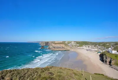 a view of a beach with the ocean at The Boy's Cottage in Portreath