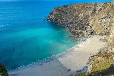 an aerial view of a beach next to the ocean at Westaway in Portreath