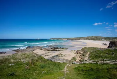 an aerial view of a beach with the ocean at 5 Fernhill in Carbis Bay