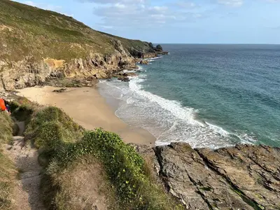 a view of a beach with the ocean at Kernyk in Helston