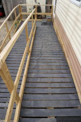 a wooden staircase leading up to a building at Kimberley Lane Static, Cornwall in Gwennap