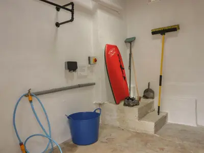 a room with stairs and a bucket and a hose at Avalon in St. Agnes