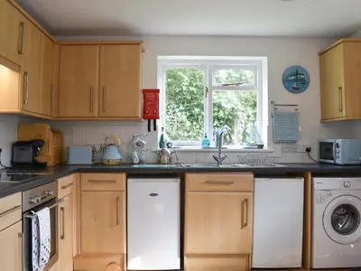 a kitchen with a sink and a dishwasher at Sea View - Uk30589 in Talland