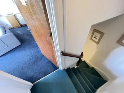 an overhead view of a staircase in a room at Crows Nest - panoramic views of St Ives harbour in St Ives