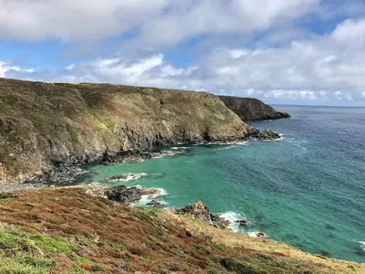 a view of the ocean from a cliff at The Poop Deck in Helston