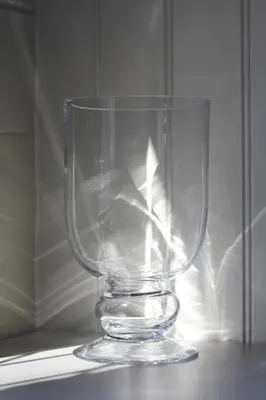 a clear glass vase sitting on a table at The Five Pilchards Inn in Helston