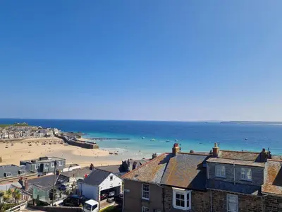a view of a beach with houses and the ocean at Little Gem in St Ives