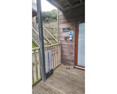 a view of the front porch of a house at Cornish Holiday - Bodannon in Porthtowan