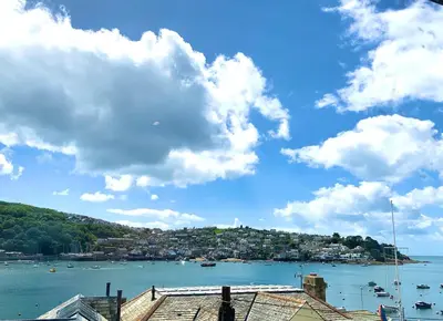 a view of a harbor with boats in the water at The Old Bakery in Fowey