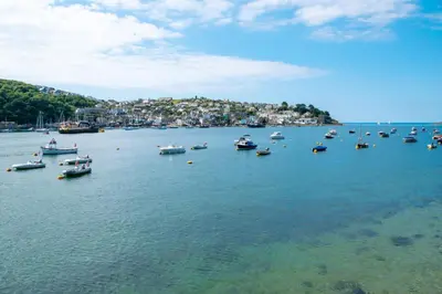 a group of boats in a large body of water at Crimpers Cottage in Fowey