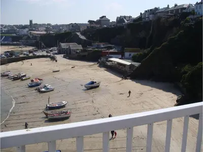 a view of a beach with boats on the sand at Harbour Hotel in Newquay