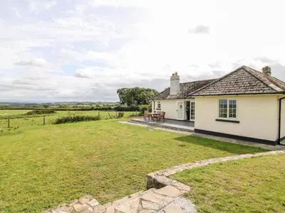 a house with a large yard in front of it at Summercourt in Launceston