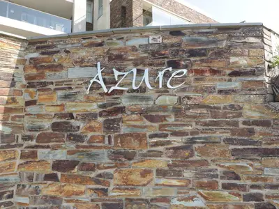 a stone wall with the word avenue written on it at Newquay Fistral Beach View in Newquay