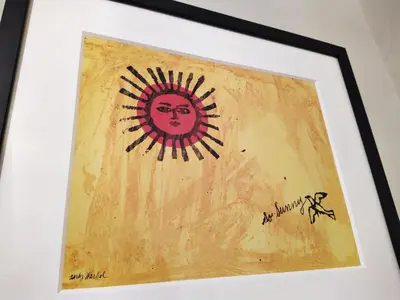 a picture of a painting of a sun at The Shire House in Lostwithiel