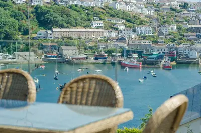 a view of a harbor with boats in the water at Luxury Victorian school with views of Harbour in Fowey