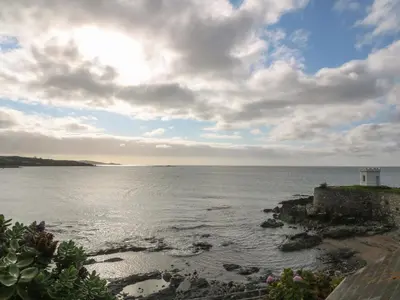 a view of the ocean on a cloudy day at Nana's House in Marazion