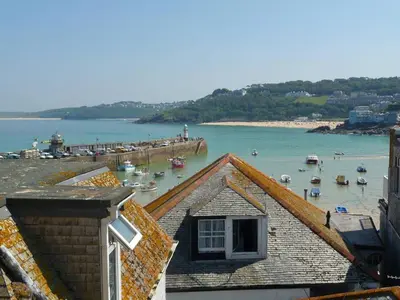 a view of a beach with boats in the water at 3 Victoria House in St Ives
