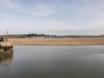 a view of a body of water with a pier at Summer Breeze in Padstow