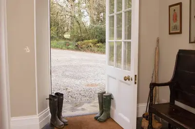an open door with a view of a driveway at Boconnion Estate Sleeps up to 45 in Bodmin