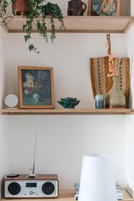 a shelf with a radio on top of a desk at Stunning views over the beautiful Falmouth Harbour in Falmouth