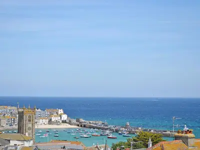 a view of a harbor with boats in the water at Little Trevarrack in Carbis Bay
