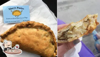 a person holding a pie and a card with a hello kitty pastry at Cottage in village of Mevagissey Cornwall Sleeps 4 in Mevagissey