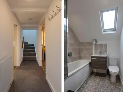a bathroom with a tub and a toilet and a sink at Rose Cottage in St Ives
