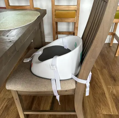 a bath tub sitting on a chair next to a table at Edge of Padstow, 2 bedroom luxury lodge in Padstow