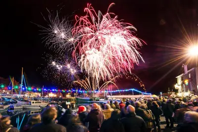 a crowd of people watching a fireworks show at Edge of Padstow, 2 bedroom luxury lodge in Padstow
