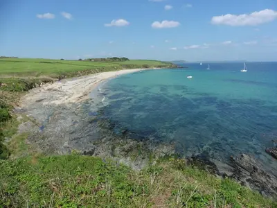 an aerial view of a beach with boats in the water at Rostowan Villa, very near the Beach in Truro