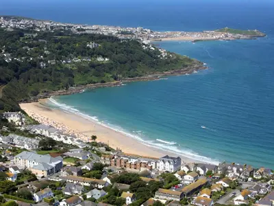 an aerial view of a beach with buildings and houses at The Cottage in St Ives