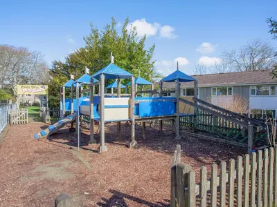 a park with a playground with a slide at 117 Atlantic Reach-Uk32918 in Saint Columb Major