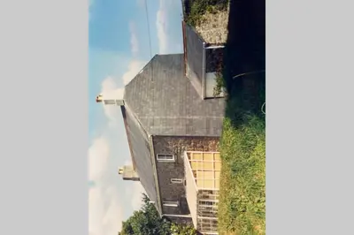 an overhead view of a house with a roof at Okewoon Farm in Lanivet