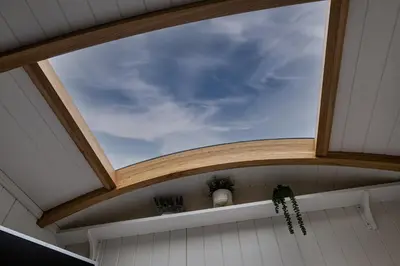 a skylight in the ceiling of a house at Trevone Luxury Shepherds hut close to the beach in St Merryn
