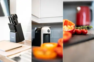 a kitchen counter with a knife block and fruits and vegetables at Harbour Vista in St Ives