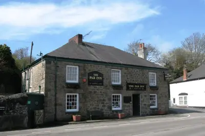 an old brick building on the side of a street at The Honeypot - Cornish Apartment close to Eden Project & beaches in Par