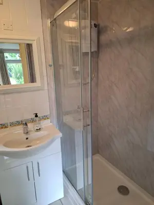 a bathroom with a shower and a sink at Blue Skies in St Ives